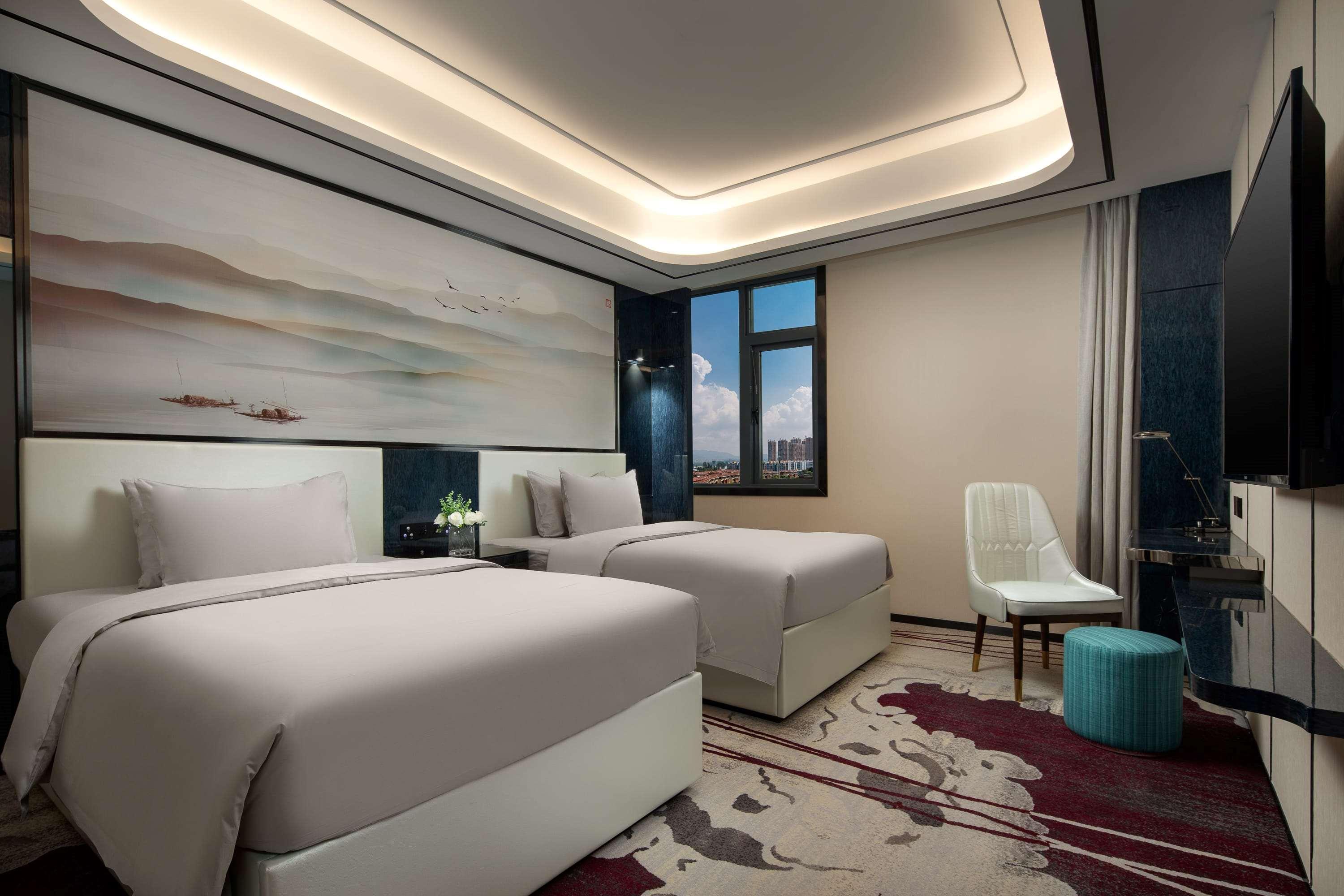 Ramada By Wyndham Mengzi Suites Exterior foto
