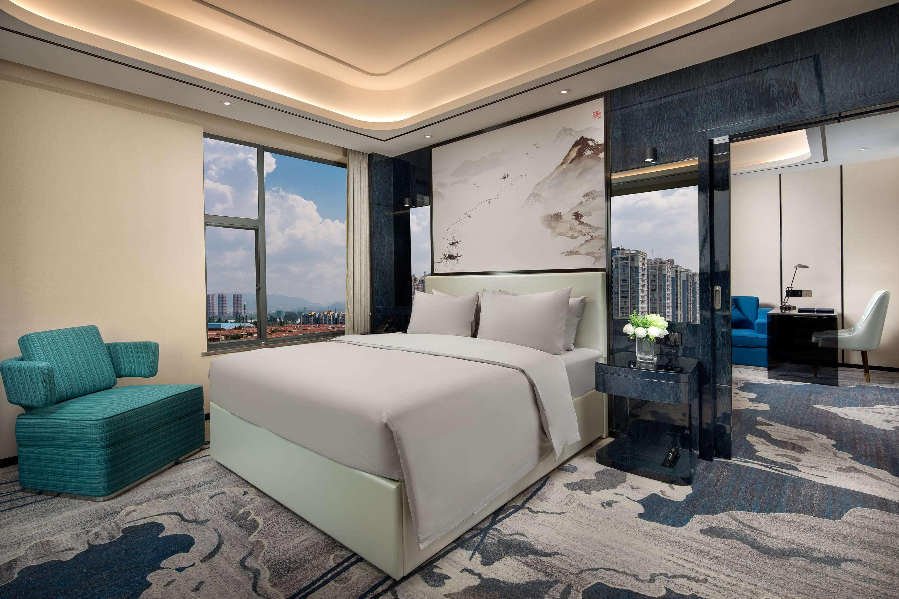 Ramada By Wyndham Mengzi Suites Exterior foto